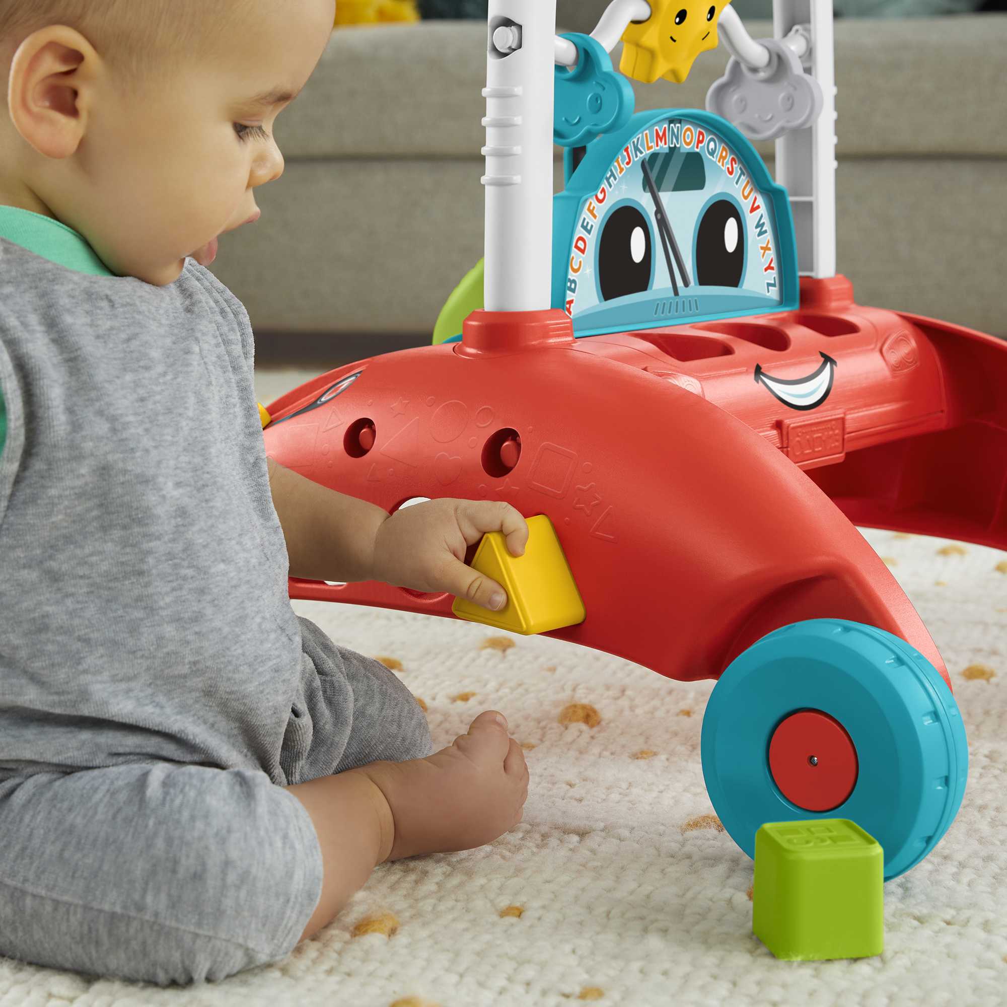 Fisher-Price Primi Passi al Volante, Edizione multilingue, giocattolo ispirato a una macchina che incoraggia i bambini a camminare, Giocattolo per bambini 6+ mesi