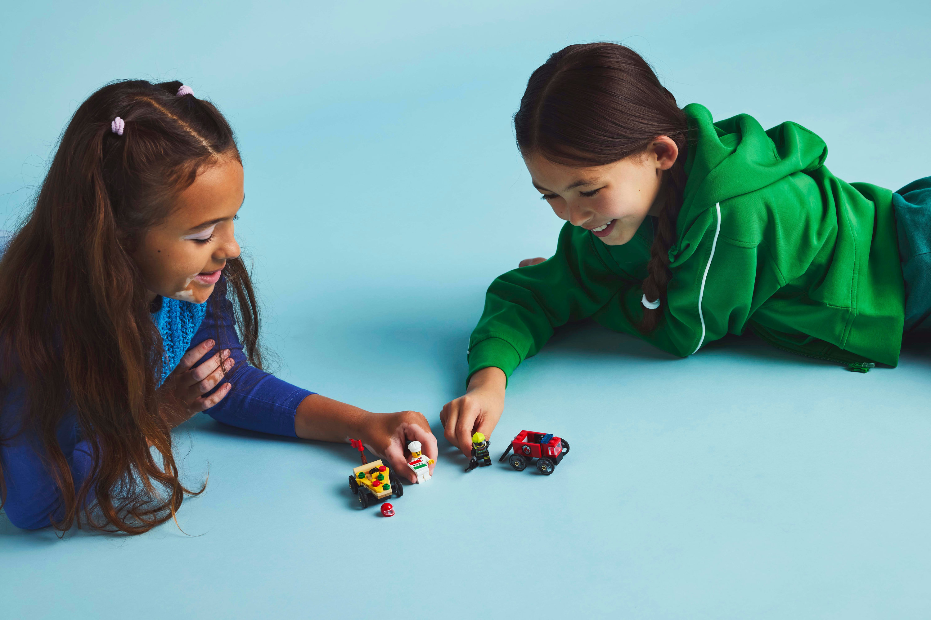 LEGO City Pack veicoli da corsa: pizzaiolo contro pompiere