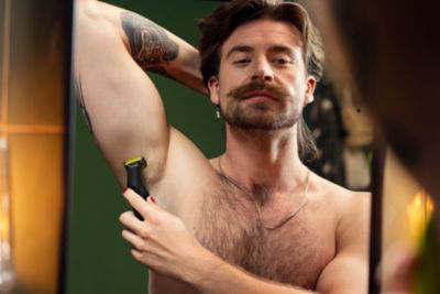 Philips OneBlade Pro 360 Face & Body Rasoio, Regolabarba e Rifinitore con Pettine di Precisione Regolabile 14 Lunghezze QP6541/15