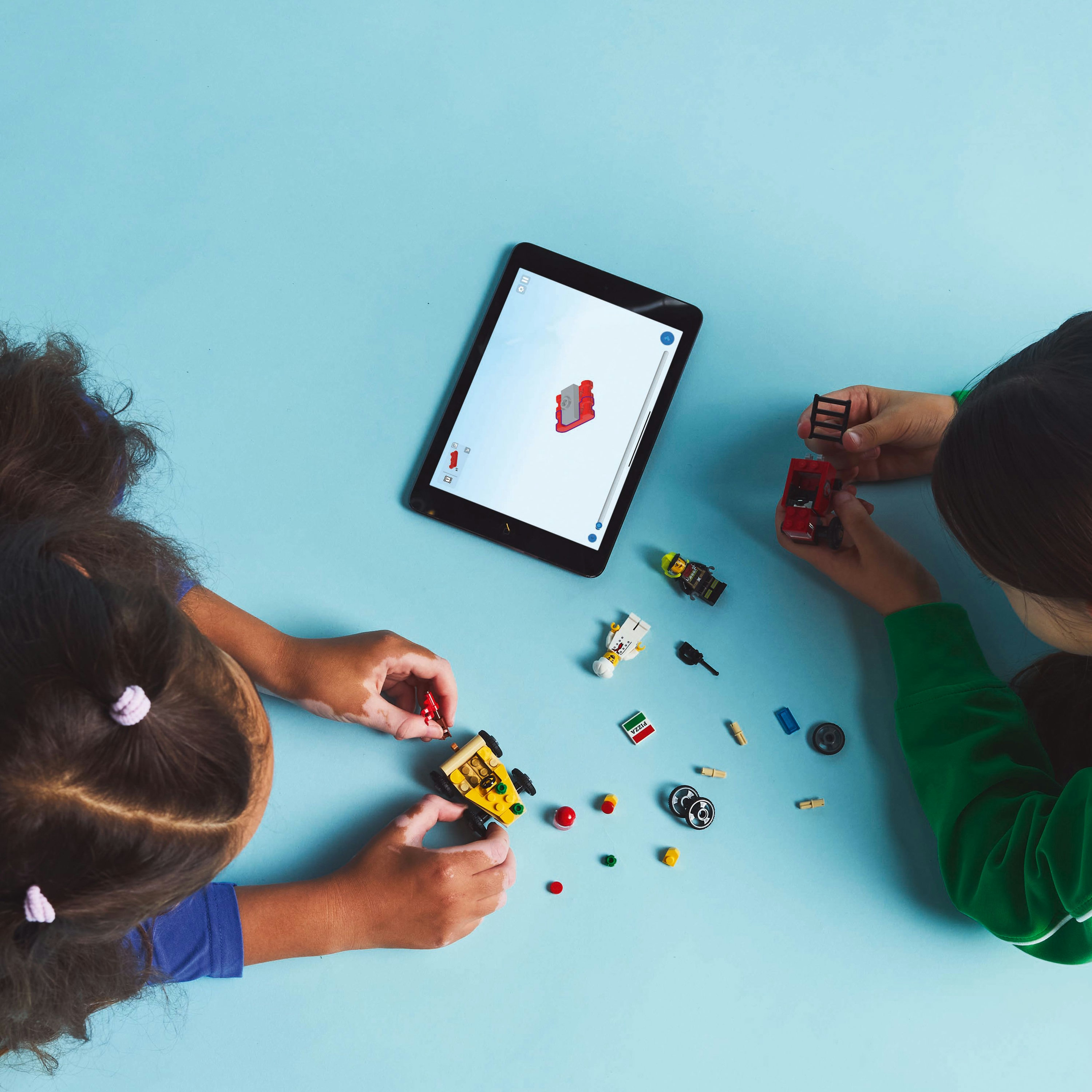 LEGO City Pack veicoli da corsa: pizzaiolo contro pompiere