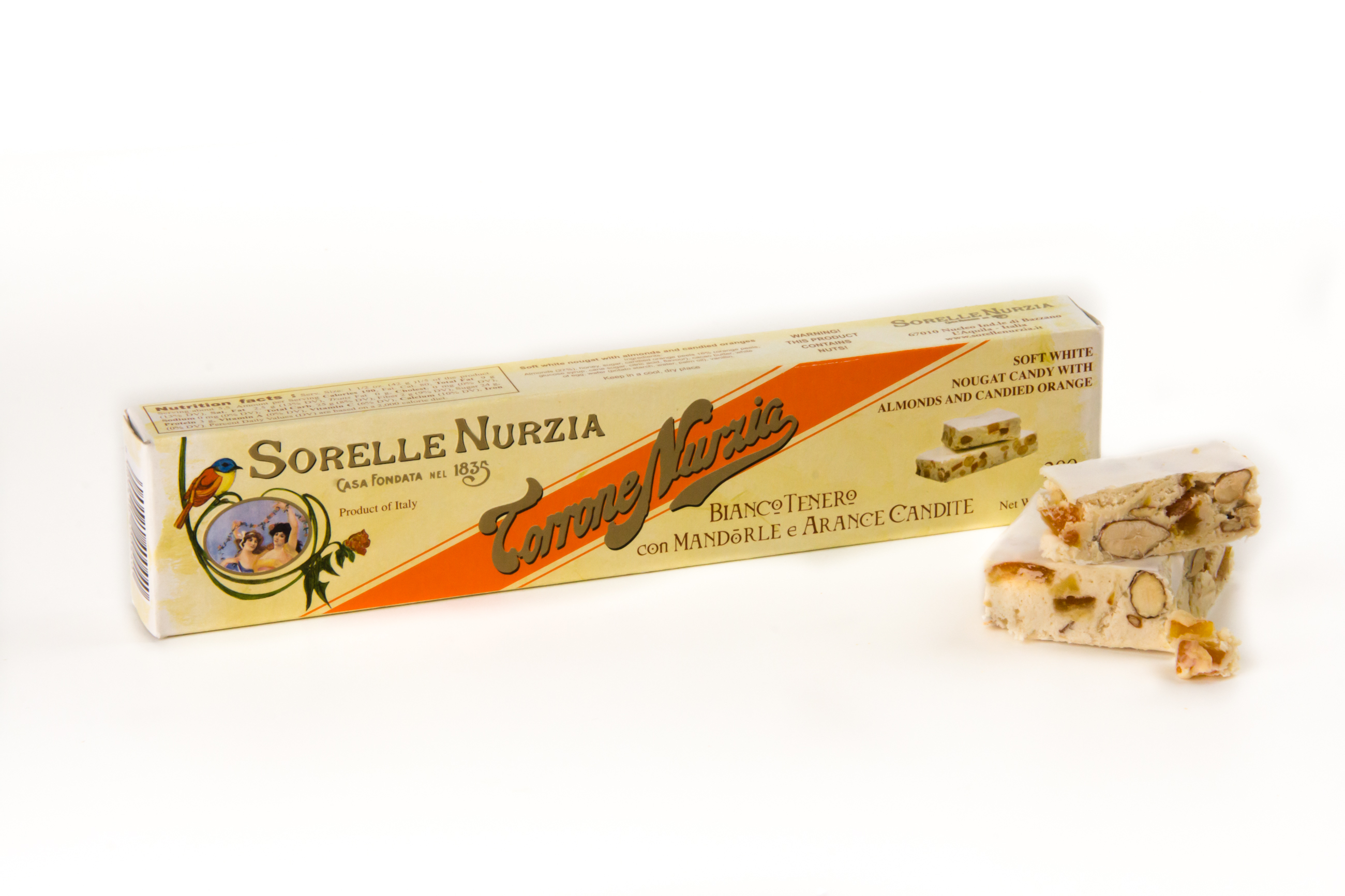 Bianco tenero con mandorle e arance candite