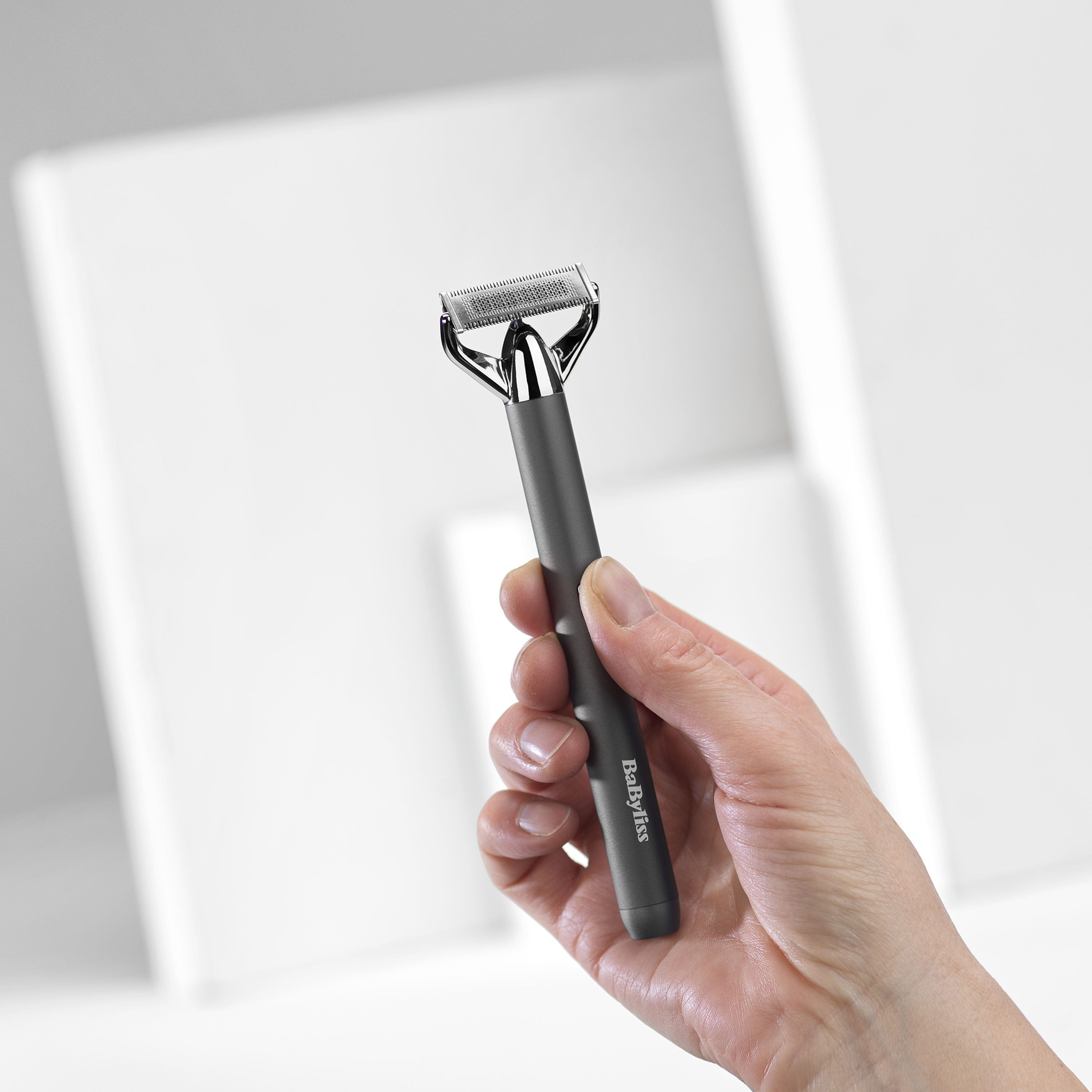 BaByliss Super-X Metal OT996E regolabarba Batteria 5 5 mm Bagnato e secco Argento