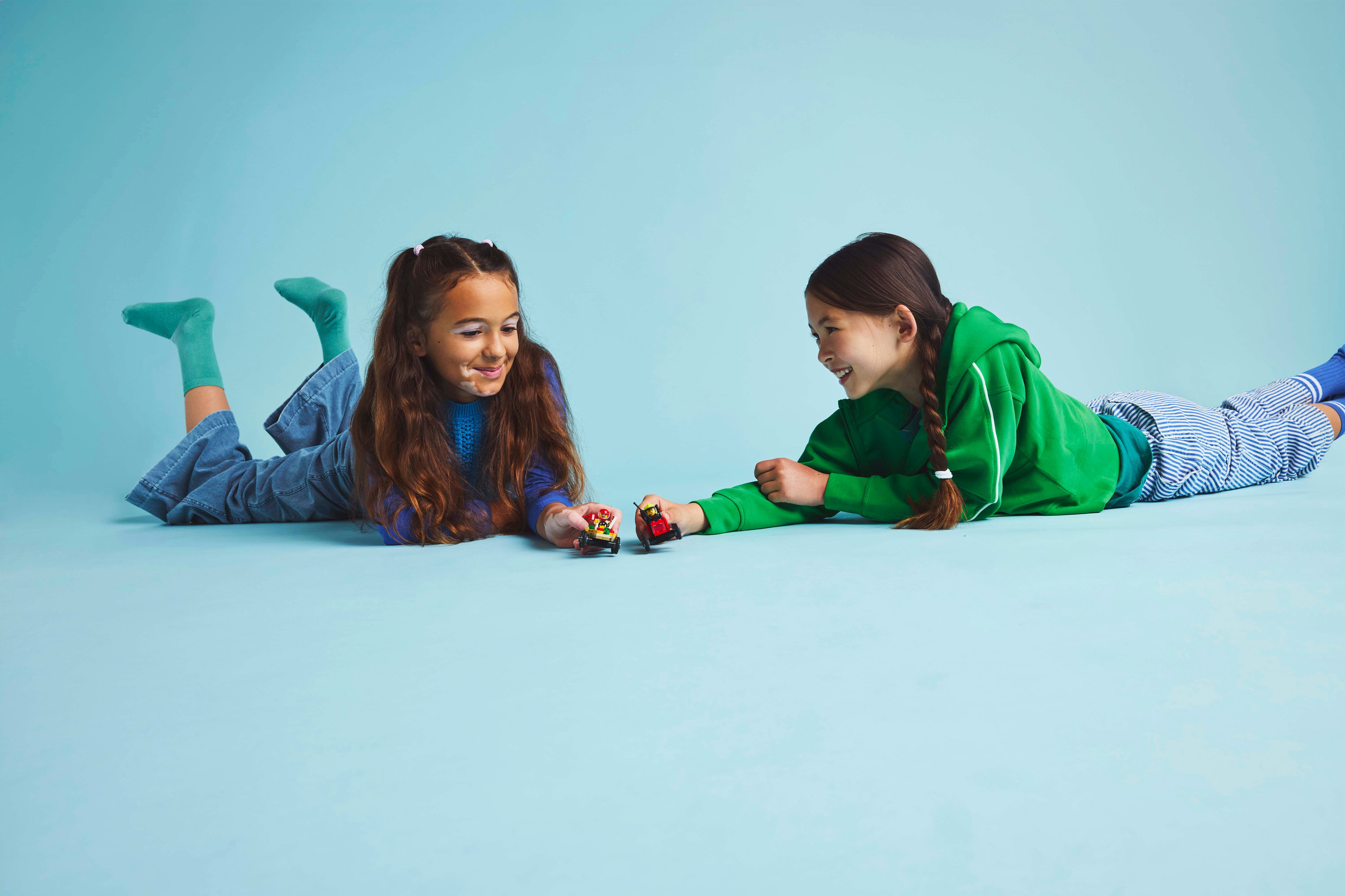 LEGO City Pack veicoli da corsa: pizzaiolo contro pompiere